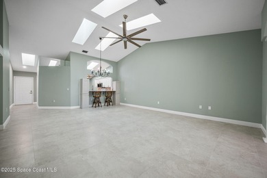 FORE! Just park your golf cart in your garage. Home handy to on Suntree Country Club in Florida - for sale on GolfHomes.com, golf home, golf lot