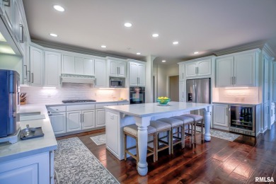 This custom built all brick home situated on the signature fifth on WeaverRidge Golf Club in Illinois - for sale on GolfHomes.com, golf home, golf lot