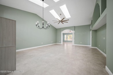 FORE! Just park your golf cart in your garage. Home handy to on Suntree Country Club in Florida - for sale on GolfHomes.com, golf home, golf lot