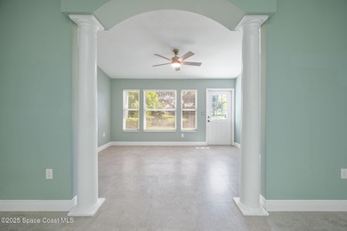 FORE! Just park your golf cart in your garage. Home handy to on Suntree Country Club in Florida - for sale on GolfHomes.com, golf home, golf lot