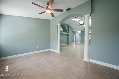 FORE! Just park your golf cart in your garage. Home handy to on Suntree Country Club in Florida - for sale on GolfHomes.com, golf home, golf lot