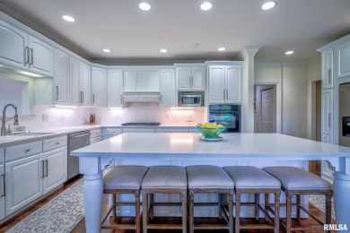 This custom built all brick home situated on the signature fifth on WeaverRidge Golf Club in Illinois - for sale on GolfHomes.com, golf home, golf lot
