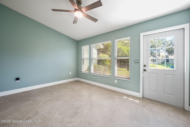 FORE! Just park your golf cart in your garage. Home handy to on Suntree Country Club in Florida - for sale on GolfHomes.com, golf home, golf lot