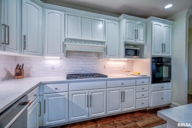 This custom built all brick home situated on the signature fifth on WeaverRidge Golf Club in Illinois - for sale on GolfHomes.com, golf home, golf lot