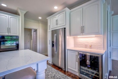 This custom built all brick home situated on the signature fifth on WeaverRidge Golf Club in Illinois - for sale on GolfHomes.com, golf home, golf lot