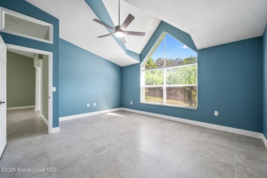 FORE! Just park your golf cart in your garage. Home handy to on Suntree Country Club in Florida - for sale on GolfHomes.com, golf home, golf lot