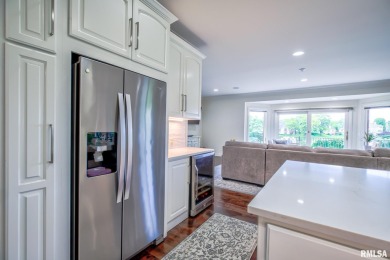 This custom built all brick home situated on the signature fifth on WeaverRidge Golf Club in Illinois - for sale on GolfHomes.com, golf home, golf lot