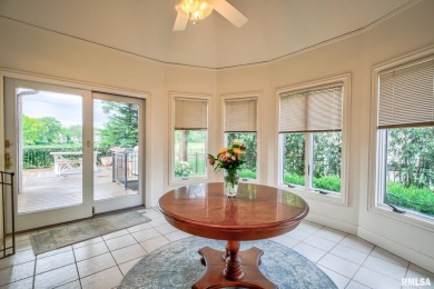 This custom built all brick home situated on the signature fifth on WeaverRidge Golf Club in Illinois - for sale on GolfHomes.com, golf home, golf lot