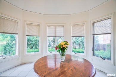This custom built all brick home situated on the signature fifth on WeaverRidge Golf Club in Illinois - for sale on GolfHomes.com, golf home, golf lot