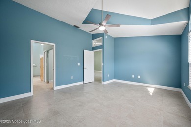 FORE! Just park your golf cart in your garage. Home handy to on Suntree Country Club in Florida - for sale on GolfHomes.com, golf home, golf lot