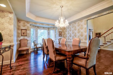 This custom built all brick home situated on the signature fifth on WeaverRidge Golf Club in Illinois - for sale on GolfHomes.com, golf home, golf lot