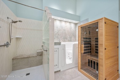 FORE! Just park your golf cart in your garage. Home handy to on Suntree Country Club in Florida - for sale on GolfHomes.com, golf home, golf lot