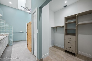 FORE! Just park your golf cart in your garage. Home handy to on Suntree Country Club in Florida - for sale on GolfHomes.com, golf home, golf lot