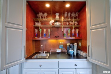 This custom built all brick home situated on the signature fifth on WeaverRidge Golf Club in Illinois - for sale on GolfHomes.com, golf home, golf lot