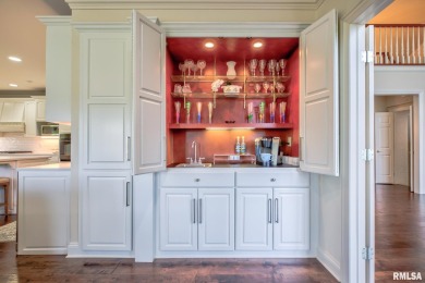 This custom built all brick home situated on the signature fifth on WeaverRidge Golf Club in Illinois - for sale on GolfHomes.com, golf home, golf lot