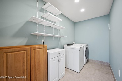 FORE! Just park your golf cart in your garage. Home handy to on Suntree Country Club in Florida - for sale on GolfHomes.com, golf home, golf lot