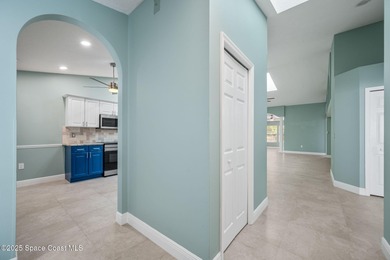 FORE! Just park your golf cart in your garage. Home handy to on Suntree Country Club in Florida - for sale on GolfHomes.com, golf home, golf lot