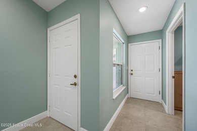 FORE! Just park your golf cart in your garage. Home handy to on Suntree Country Club in Florida - for sale on GolfHomes.com, golf home, golf lot