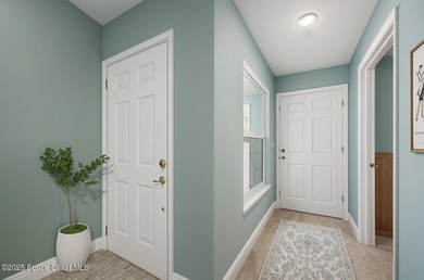 FORE! Just park your golf cart in your garage. Home handy to on Suntree Country Club in Florida - for sale on GolfHomes.com, golf home, golf lot