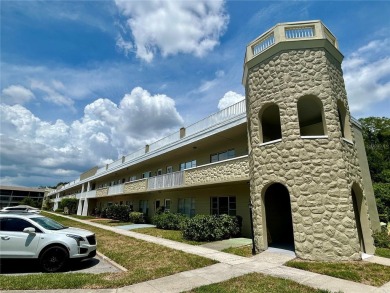This rare 1 bed/1 bath, first floor end unit is waiting for you on On Top Of The World Golf Course in Florida - for sale on GolfHomes.com, golf home, golf lot