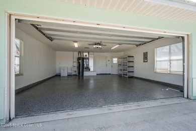 FORE! Just park your golf cart in your garage. Home handy to on Suntree Country Club in Florida - for sale on GolfHomes.com, golf home, golf lot