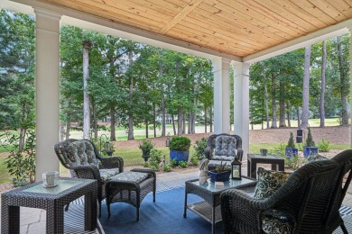 Welcome to this stunning 5,195 sq ft, 5-bedroom, 4.5-bath home on Reynolds Lake Oconee - The Landing in Georgia - for sale on GolfHomes.com, golf home, golf lot