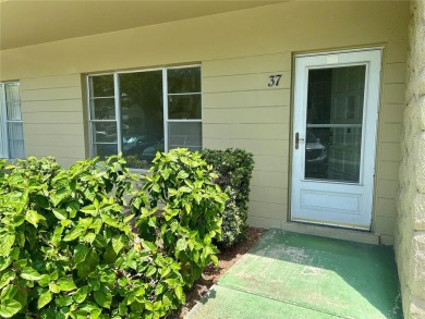 This rare 1 bed/1 bath, first floor end unit is waiting for you on On Top Of The World Golf Course in Florida - for sale on GolfHomes.com, golf home, golf lot