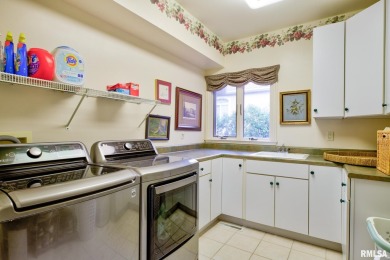 This custom built all brick home situated on the signature fifth on WeaverRidge Golf Club in Illinois - for sale on GolfHomes.com, golf home, golf lot