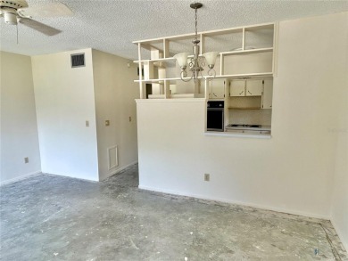 This rare 1 bed/1 bath, first floor end unit is waiting for you on On Top Of The World Golf Course in Florida - for sale on GolfHomes.com, golf home, golf lot