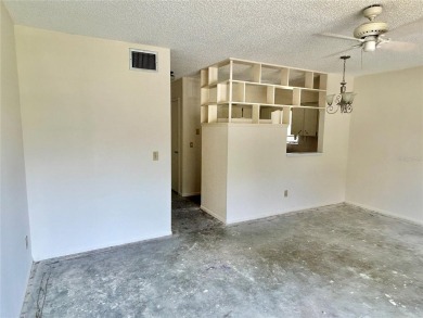 This rare 1 bed/1 bath, first floor end unit is waiting for you on On Top Of The World Golf Course in Florida - for sale on GolfHomes.com, golf home, golf lot