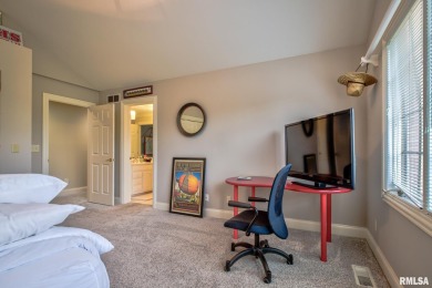 This custom built all brick home situated on the signature fifth on WeaverRidge Golf Club in Illinois - for sale on GolfHomes.com, golf home, golf lot