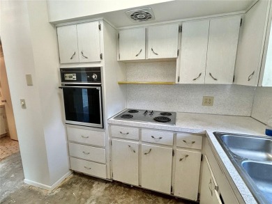 This rare 1 bed/1 bath, first floor end unit is waiting for you on On Top Of The World Golf Course in Florida - for sale on GolfHomes.com, golf home, golf lot