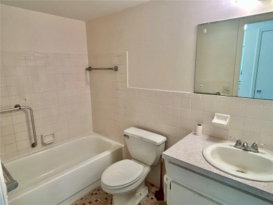 This rare 1 bed/1 bath, first floor end unit is waiting for you on On Top Of The World Golf Course in Florida - for sale on GolfHomes.com, golf home, golf lot