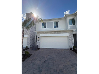 Beautiful 3-bedroom, 2.5-bath townhome located in the highly on National Golf Course in Florida - for sale on GolfHomes.com, golf home, golf lot