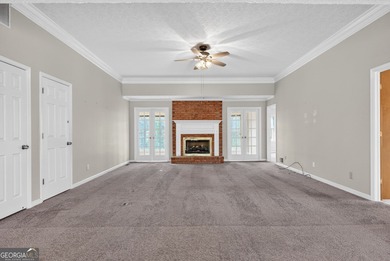 Welcome to this expansive four-sided brick ranch home situated on Lake Spivey Golf Club in Georgia - for sale on GolfHomes.com, golf home, golf lot