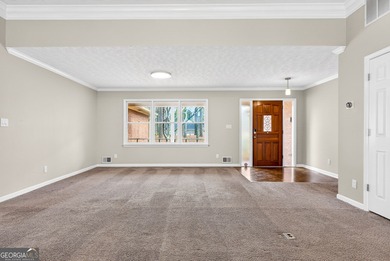 Welcome to this expansive four-sided brick ranch home situated on Lake Spivey Golf Club in Georgia - for sale on GolfHomes.com, golf home, golf lot