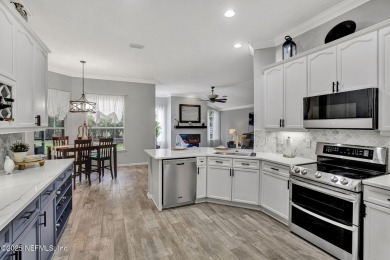 Exquisite 5BR/4BA home with 3,142 SF in Eagle Harbor on a on Eagle Harbor Golf Club in Florida - for sale on GolfHomes.com, golf home, golf lot