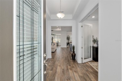 Gorgeous ALMOST NEW 2024 home in Candler Hills in On Top of the on On Top of the World Golf Course in Florida - for sale on GolfHomes.com, golf home, golf lot
