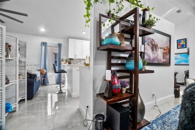 Do not be late! Beautiful completely updated home in prestigious on TPC Eagle Trace in Florida - for sale on GolfHomes.com, golf home, golf lot