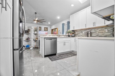 Do not be late! Beautiful completely updated home in prestigious on TPC Eagle Trace in Florida - for sale on GolfHomes.com, golf home, golf lot