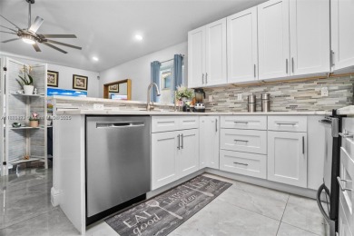 Do not be late! Beautiful completely updated home in prestigious on TPC Eagle Trace in Florida - for sale on GolfHomes.com, golf home, golf lot