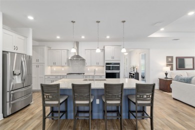 Gorgeous ALMOST NEW 2024 home in Candler Hills in On Top of the on On Top of the World Golf Course in Florida - for sale on GolfHomes.com, golf home, golf lot