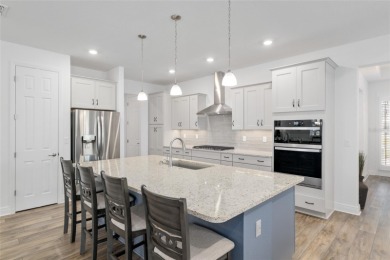 Gorgeous ALMOST NEW 2024 home in Candler Hills in On Top of the on On Top of the World Golf Course in Florida - for sale on GolfHomes.com, golf home, golf lot