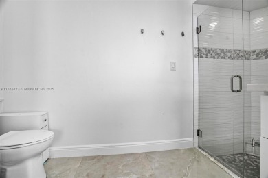 Do not be late! Beautiful completely updated home in prestigious on TPC Eagle Trace in Florida - for sale on GolfHomes.com, golf home, golf lot