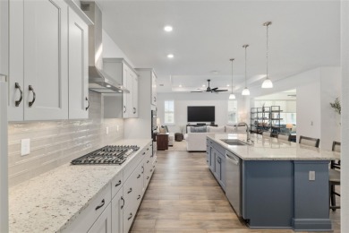 Gorgeous ALMOST NEW 2024 home in Candler Hills in On Top of the on On Top of the World Golf Course in Florida - for sale on GolfHomes.com, golf home, golf lot