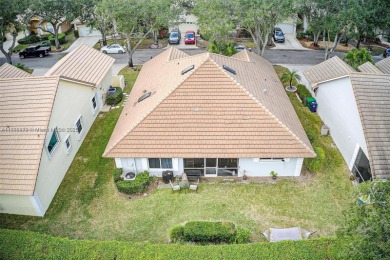 Do not be late! Beautiful completely updated home in prestigious on TPC Eagle Trace in Florida - for sale on GolfHomes.com, golf home, golf lot