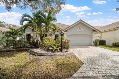 Do not be late! Beautiful completely updated home in prestigious on TPC Eagle Trace in Florida - for sale on GolfHomes.com, golf home, golf lot