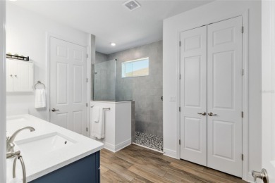 Gorgeous ALMOST NEW 2024 home in Candler Hills in On Top of the on On Top of the World Golf Course in Florida - for sale on GolfHomes.com, golf home, golf lot