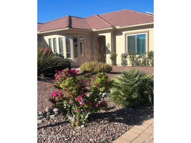 This custom home by Roark Construction is a 3 Bedroom, 2 Bath on Coyote Lakes Golf Club in Arizona - for sale on GolfHomes.com, golf home, golf lot