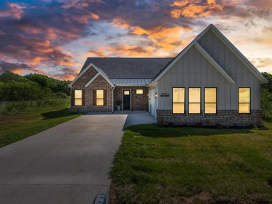 Welcome to 22202 Field Street - A Distinguished Retreat in White on White Bluff Resort - New Course in Texas - for sale on GolfHomes.com, golf home, golf lot